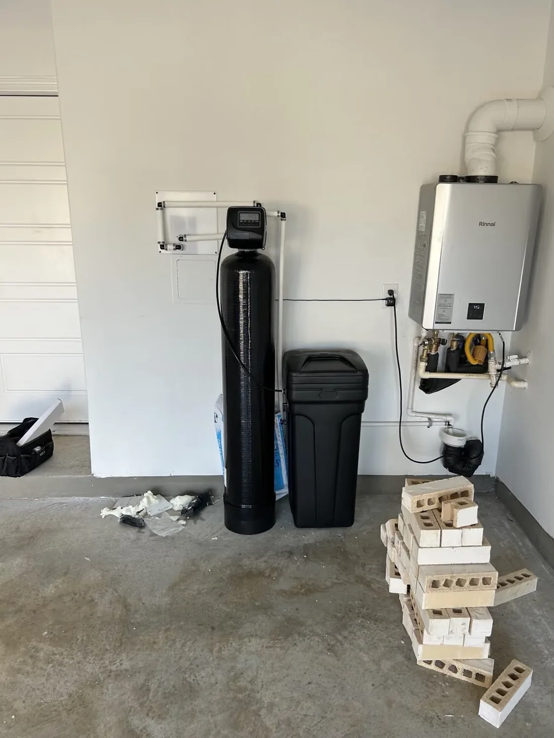 Beside the tankless heater