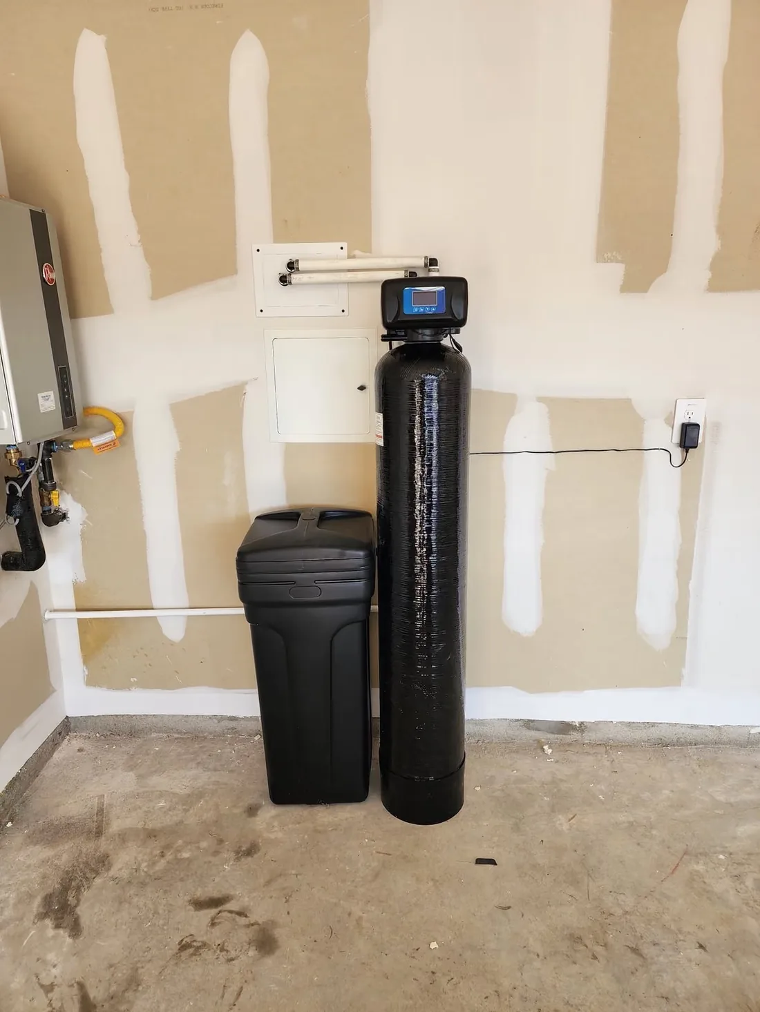 Softener and brine tank, garage wall